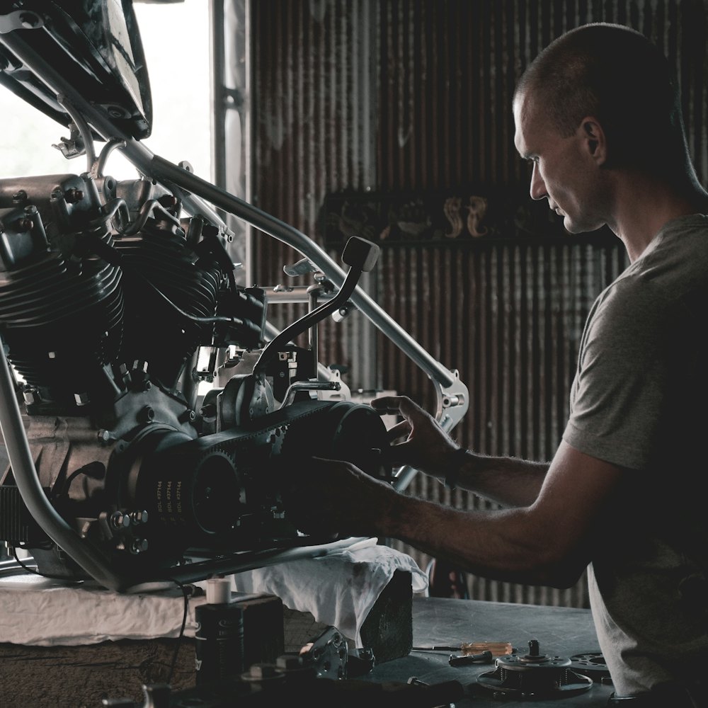 Technician working on an engine in the workshop