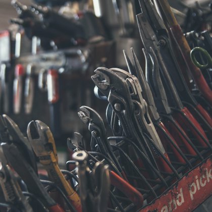 Mechanic's tools laid out in a drawer
